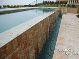 Kronos Limestone cladding on the walls of a wine cellar and a spa bath
